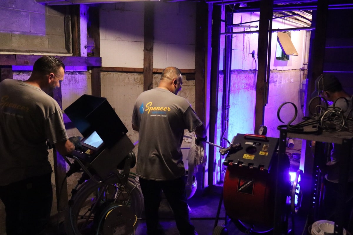 Spencer Home Services trenchless sewer repair team in Salem, Massachusetts
